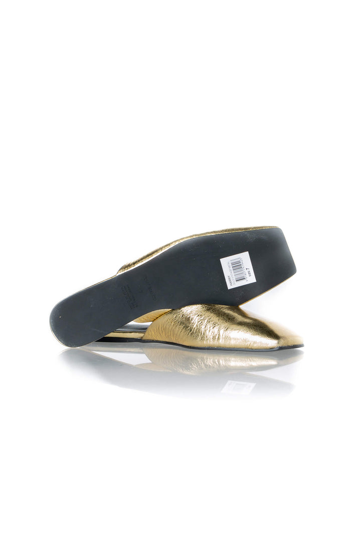 Suelas negras del par Tony Bianco flat dorado, talla 7