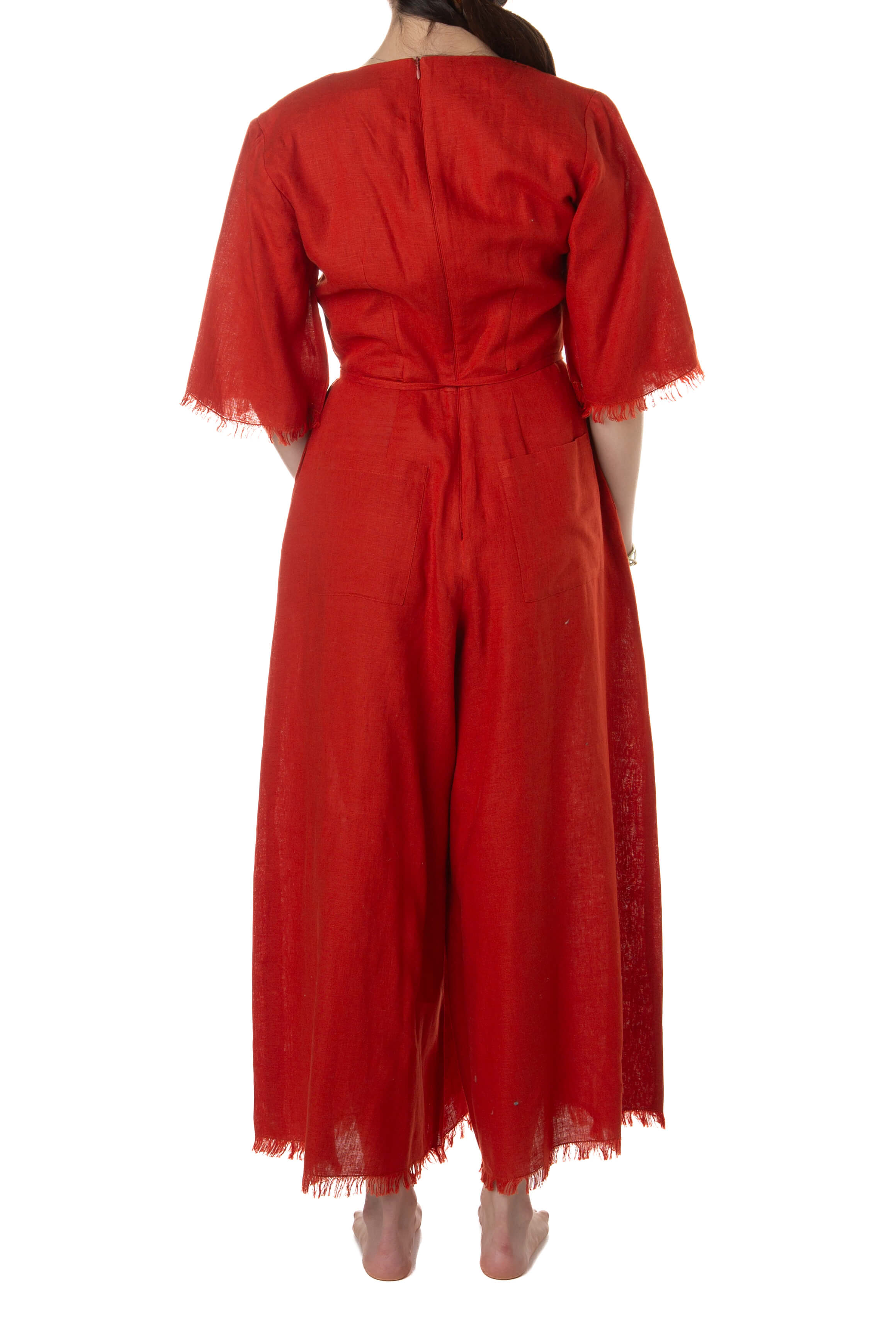 Jumpsuit Adolfo Domínguez terracota, vista trasera con pierna ancha