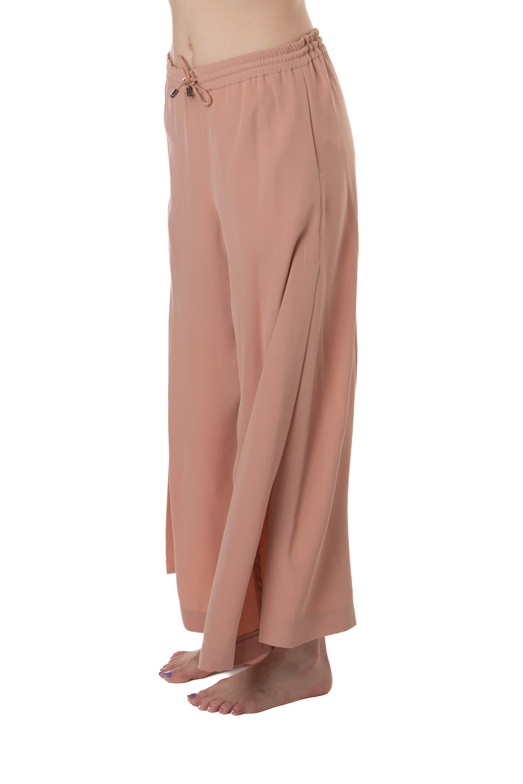 Pantalón Chloé rosa coral wide leg con abertura lateral, vista de perfil