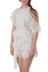 Jumpsuit Zimmermann blanco bordado con cinturón, vista frontal