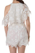 Jumpsuit Zimmermann blanco, vista trasera con cuello halter