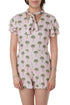 Jumpsuit Alice + Olivia rosa con palmeras y lazo, vista frontal