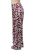 Pantalón Alexis satinado vino con flores menta, pierna amplia, vista lateral