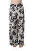 Pantalón de seda floral blanco y negro, pierna amplia, vista frontal