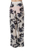 Pantalón de seda floral blanco y negro, pierna amplia, vista trasera
