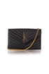Cartera Saint Laurent Cassandre negra con monograma YSL y cadena dorada