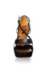 Gucci Sandalias de plataforma con tiras de charol — vista frontal