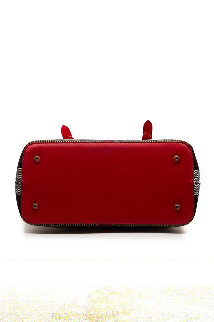 Base de piel roja con pies metálicos de tote Burberry