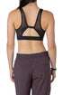 Top deportivo Nike negro con estampado blanco, vista trasera
