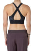 Top deportivo Nike Air negro con logo neón, vista trasera
