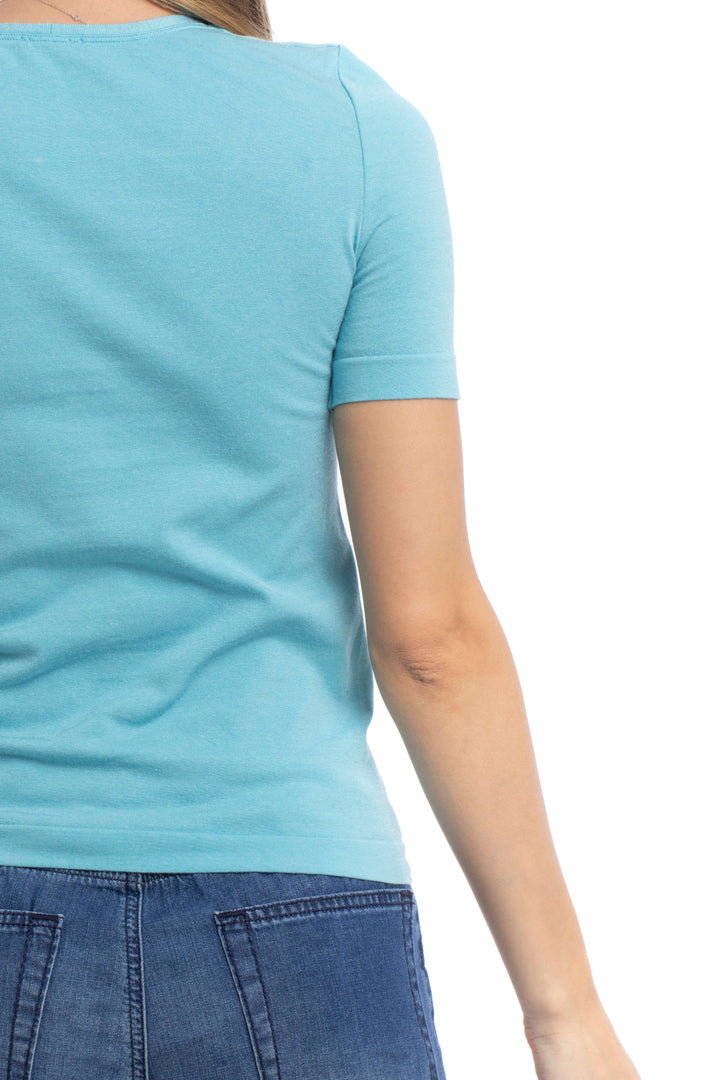 Blusa Wolford turquesa de manga corta, detalle de la espalda