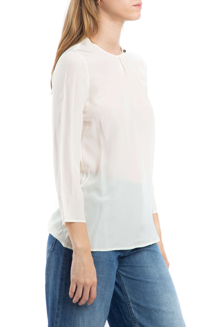 Blusa Salvatore Ferragamo de seda marfil, vista lateral