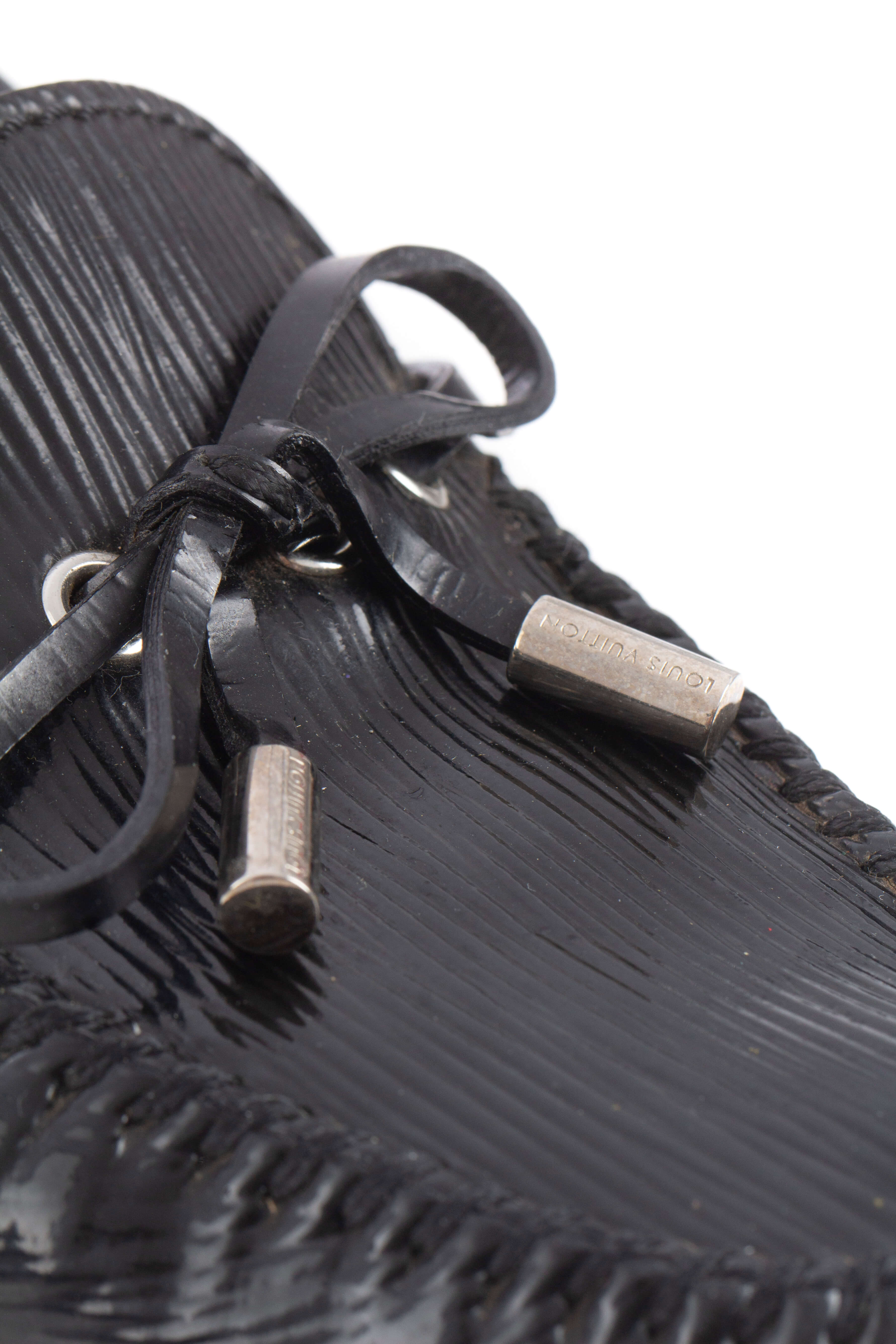 Louis Vuitton, Talla 6