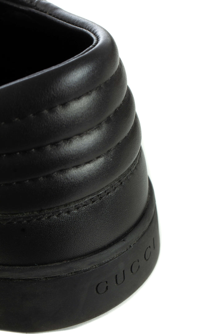 Tenis Gucci negro GG Supreme, detalle del talón