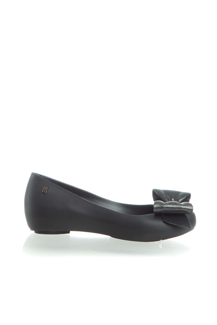 Flats ballerinas Melissa negros con moño escarchado, vista lateral