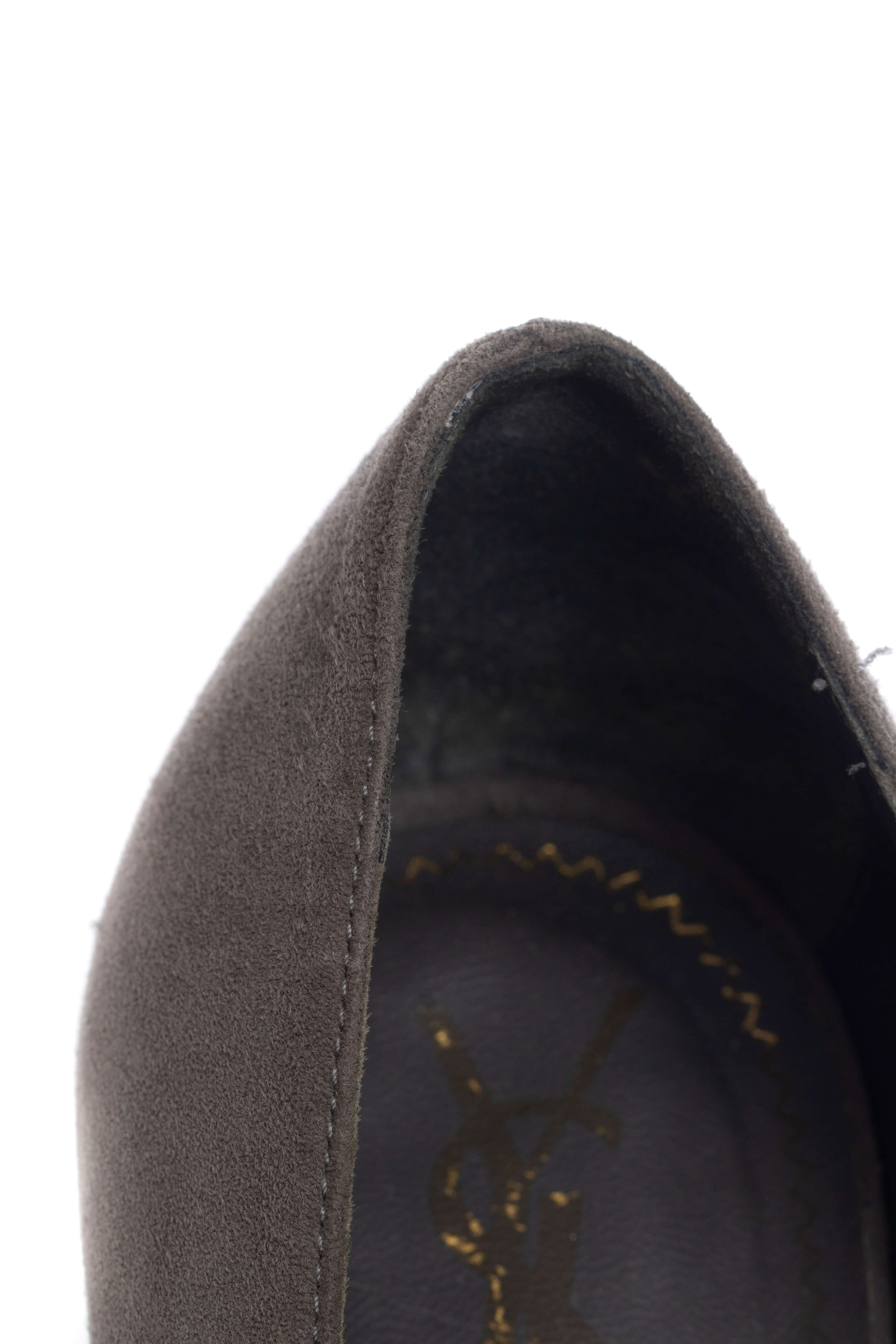 Yves Saint Laurent, Talla 8