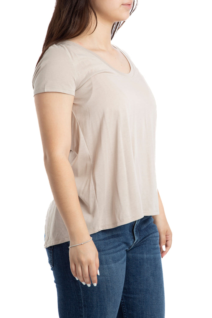 Blusa BCBGMAXAZRIA beige básica con espalda cruzada, vista lateral