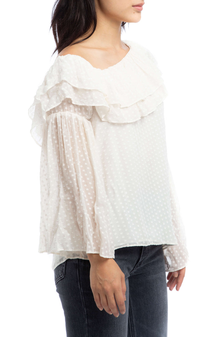 Blusa Parker blanca a puntos con olán en el escote, vista lateral