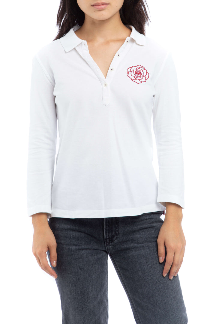 Polo blanca CH Carolina Herrera de manga larga con escudo bordado rosa, vista frontal – ClosetRehab