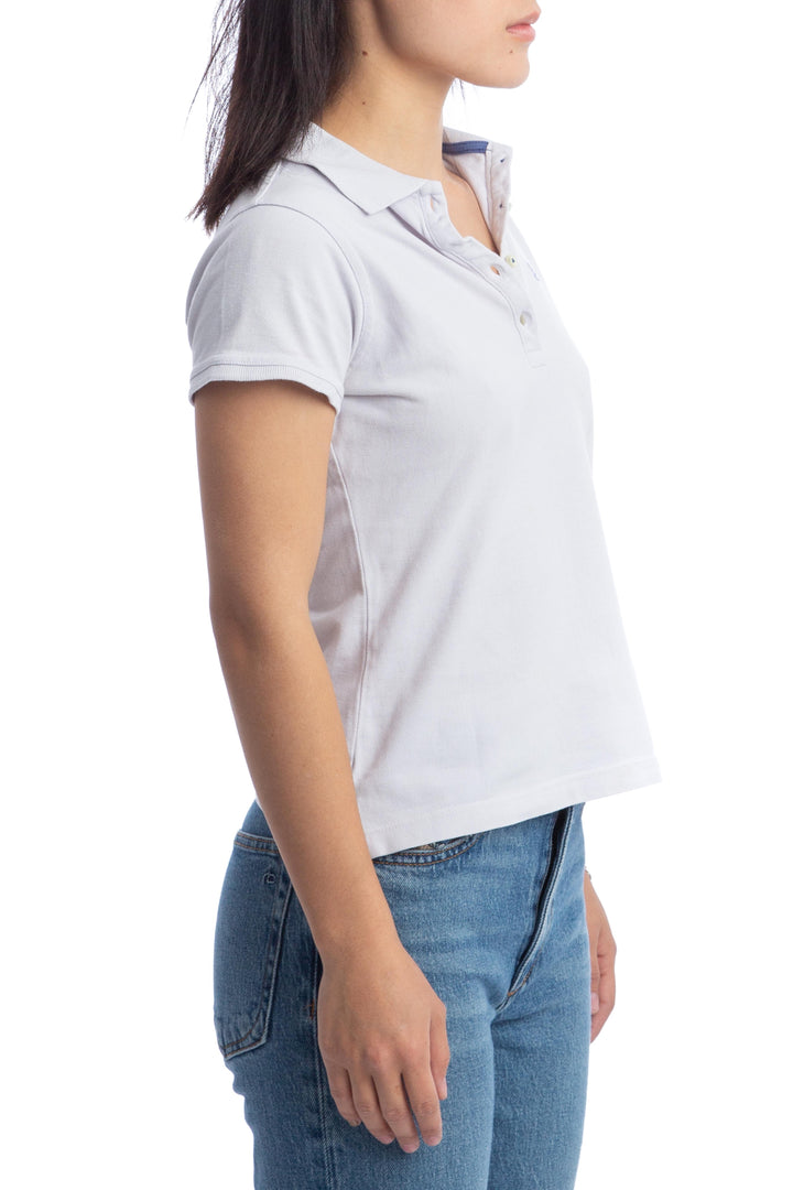 Polo blanca CH Carolina Herrera de manga corta con detalles azules, vista posterior – ClosetRehab