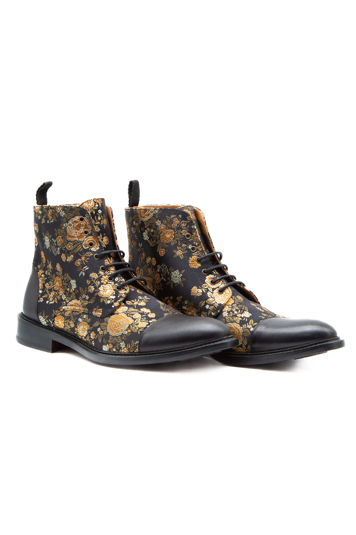 Bota Taft jacquard negro y dorado, par visto de frente