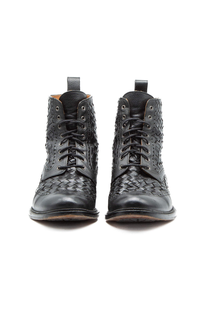 Bota Taft piel tejida negra, vista lateral interior