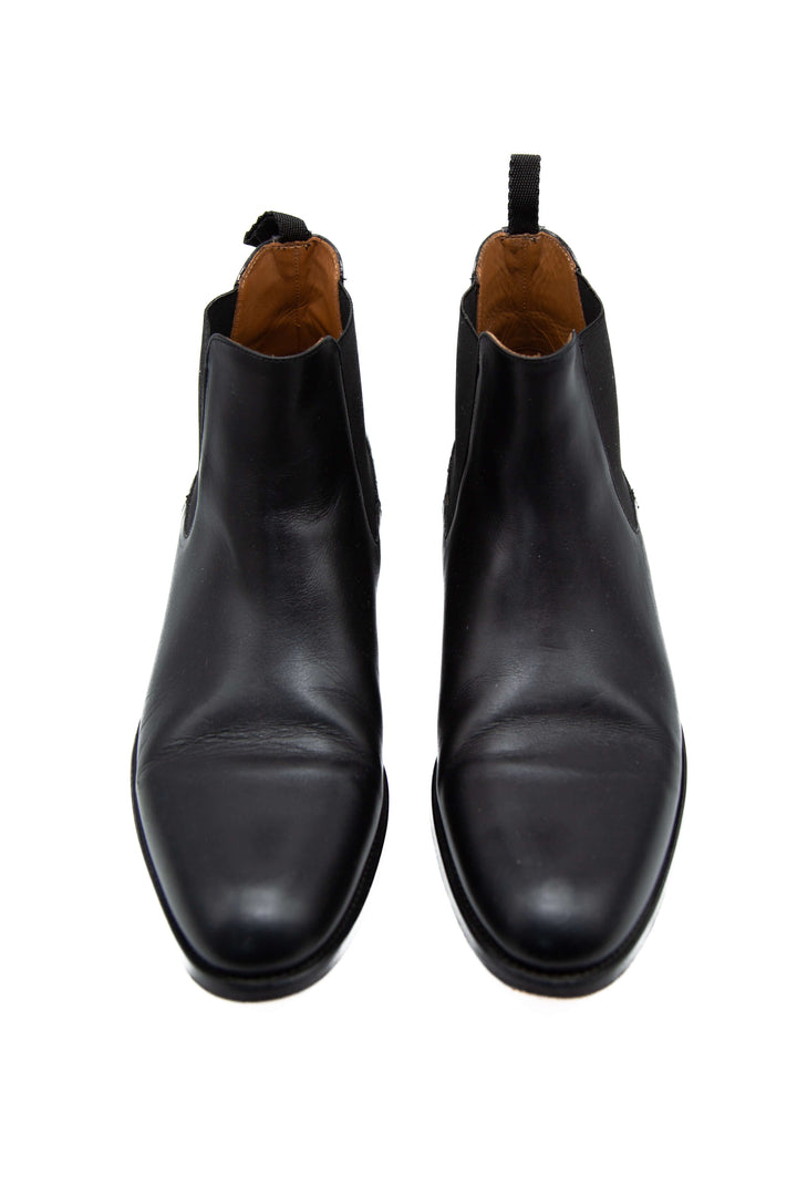 Par de botas Chelsea Taft vistas desde el talón