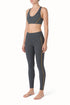 Conjunto deportivo Nike gris con vivos amarillos, talla S, vista lateral - ClosetRehab