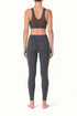 Conjunto deportivo Nike gris, top con espalda de malla, talla S, vista trasera - ClosetRehab