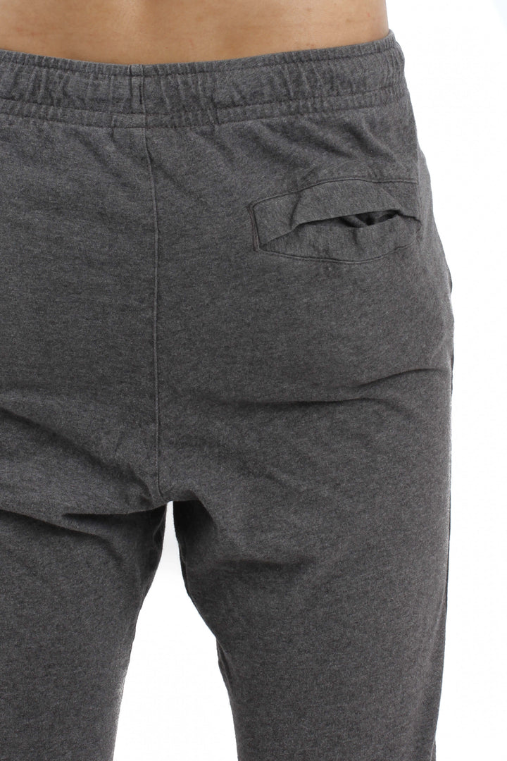 Pantalón Nike gris, vista lateral – ClosetRehab