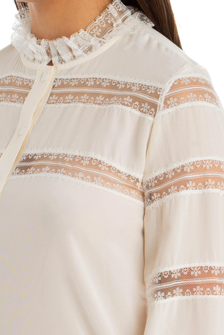 Blusa Sandro blanca con franjas de encaje, detalle lateral