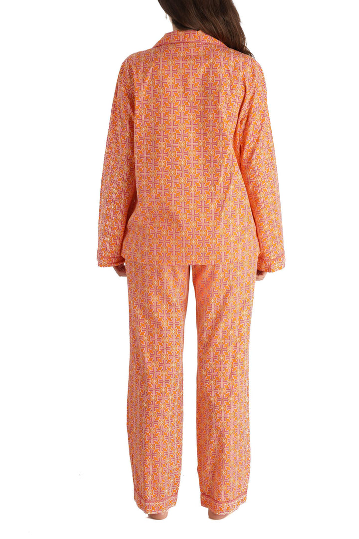 Conjunto Tory Burch estampado y naranja, vista posterior – ClosetRehab