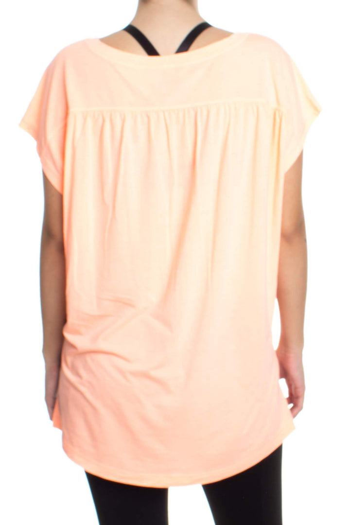 Blusa Zella naranja, vista posterior – ClosetRehab