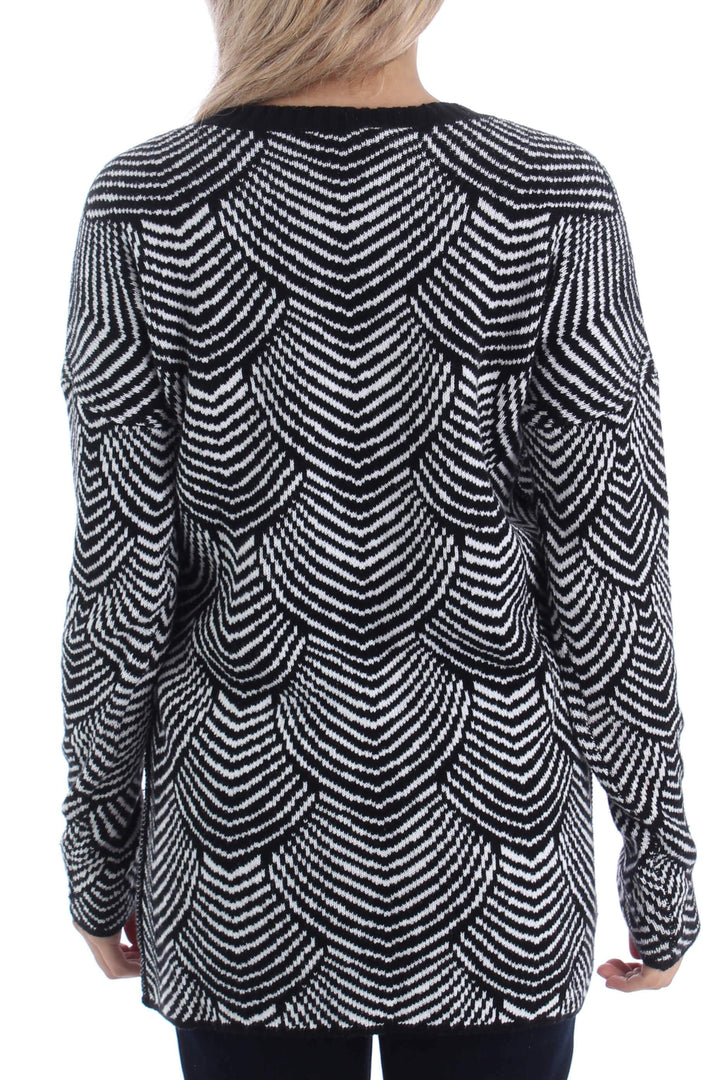 Suéter BCBG Generation estampado y negro, vista posterior – ClosetRehab