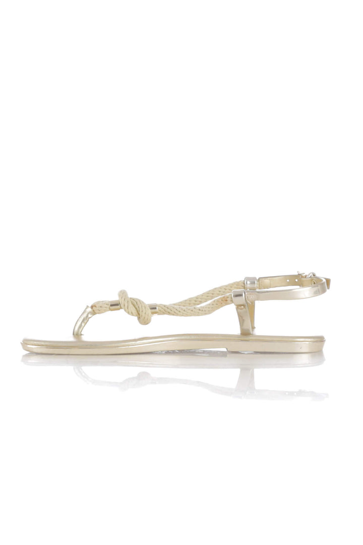 Zapato Michael Kors dorado, vista lateral – ClosetRehab