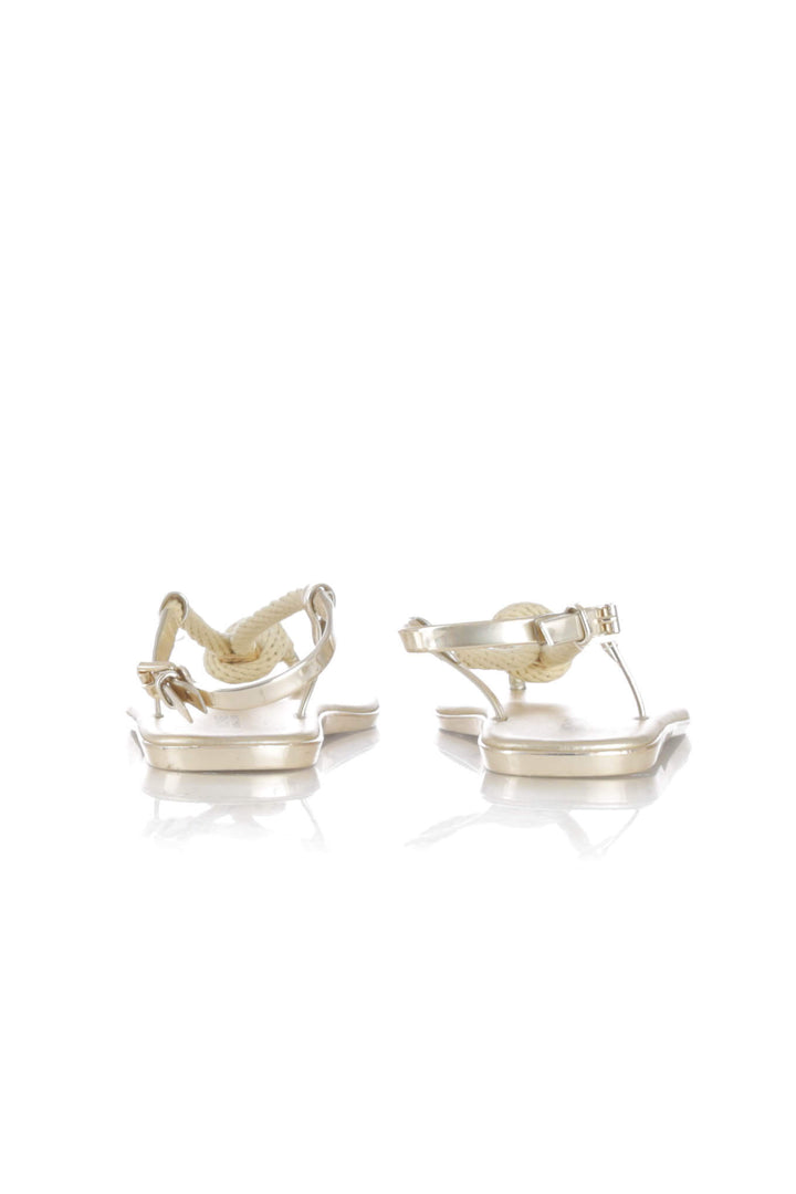 Zapato Michael Kors dorado, detalle – ClosetRehab