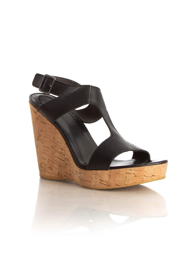Zapato Stuart Weitzman negro, vista posterior – ClosetRehab
