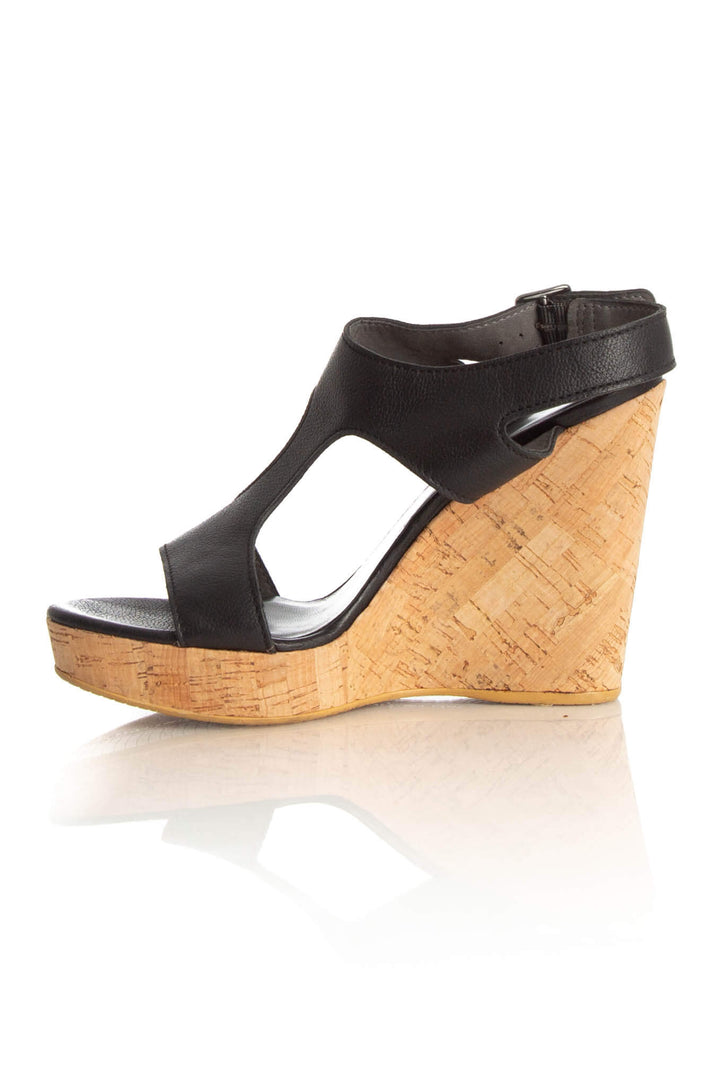 Zapato Stuart Weitzman negro, vista lateral – ClosetRehab