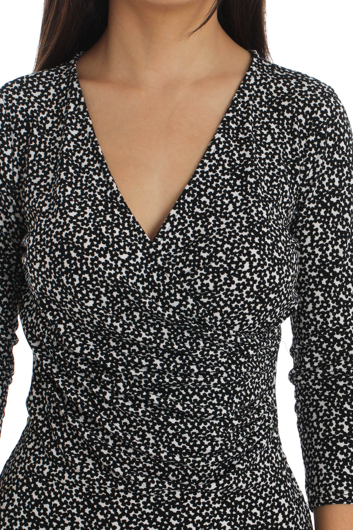 Blusa Ann Taylor estampado y negro, vista lateral – ClosetRehab