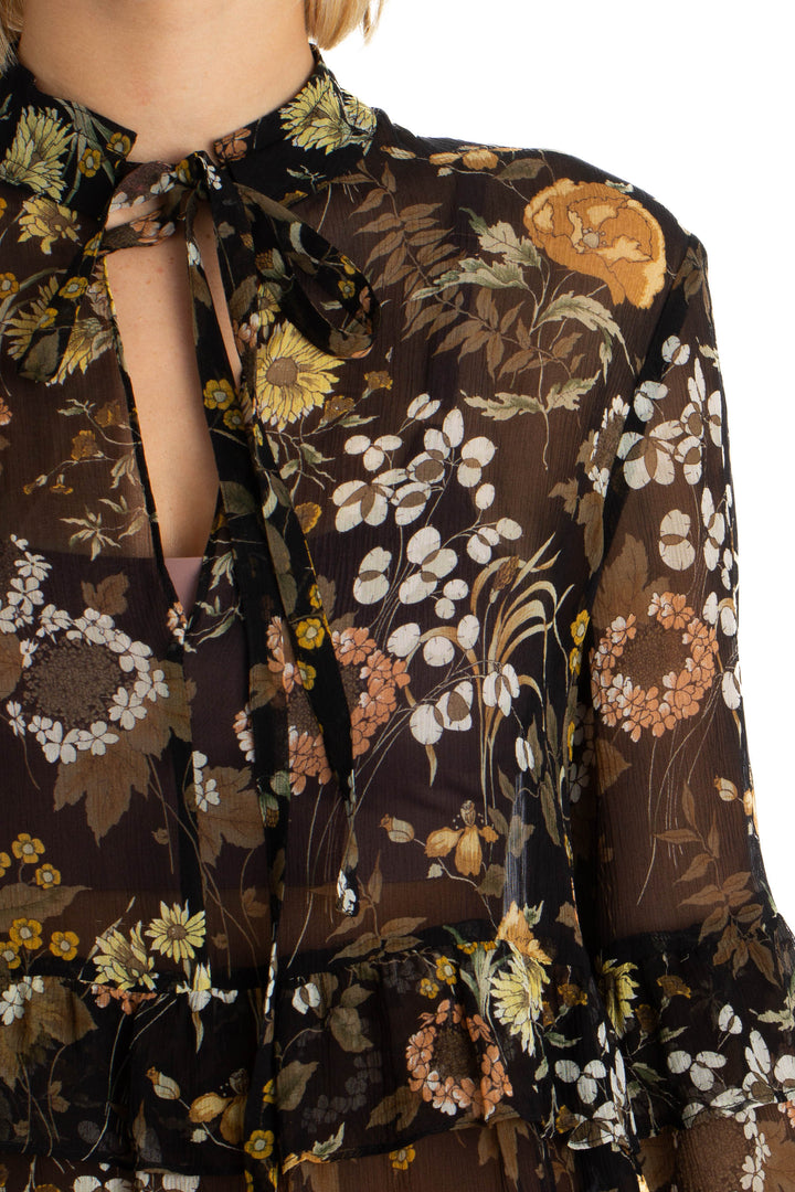 Blusa Robert Rodriguez floral transparente de manga larga, detalle del escote