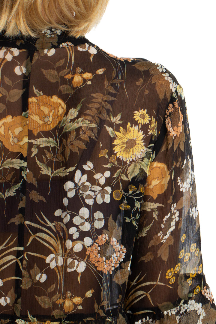 Blusa Robert Rodriguez floral transparente de manga larga, detalle de la espalda