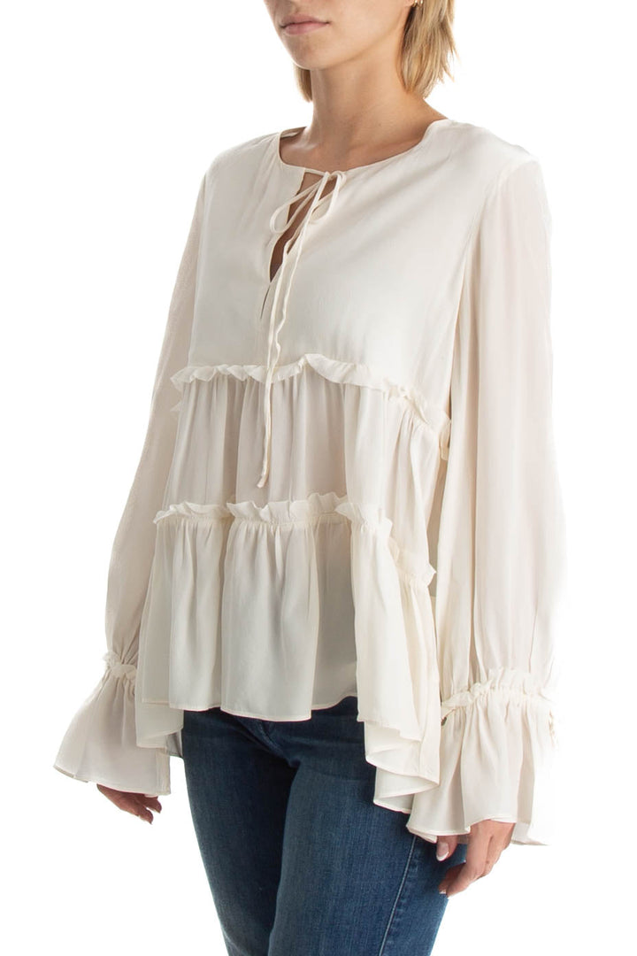 Blusa Alexis marfil con holanes y lazo, vista lateral